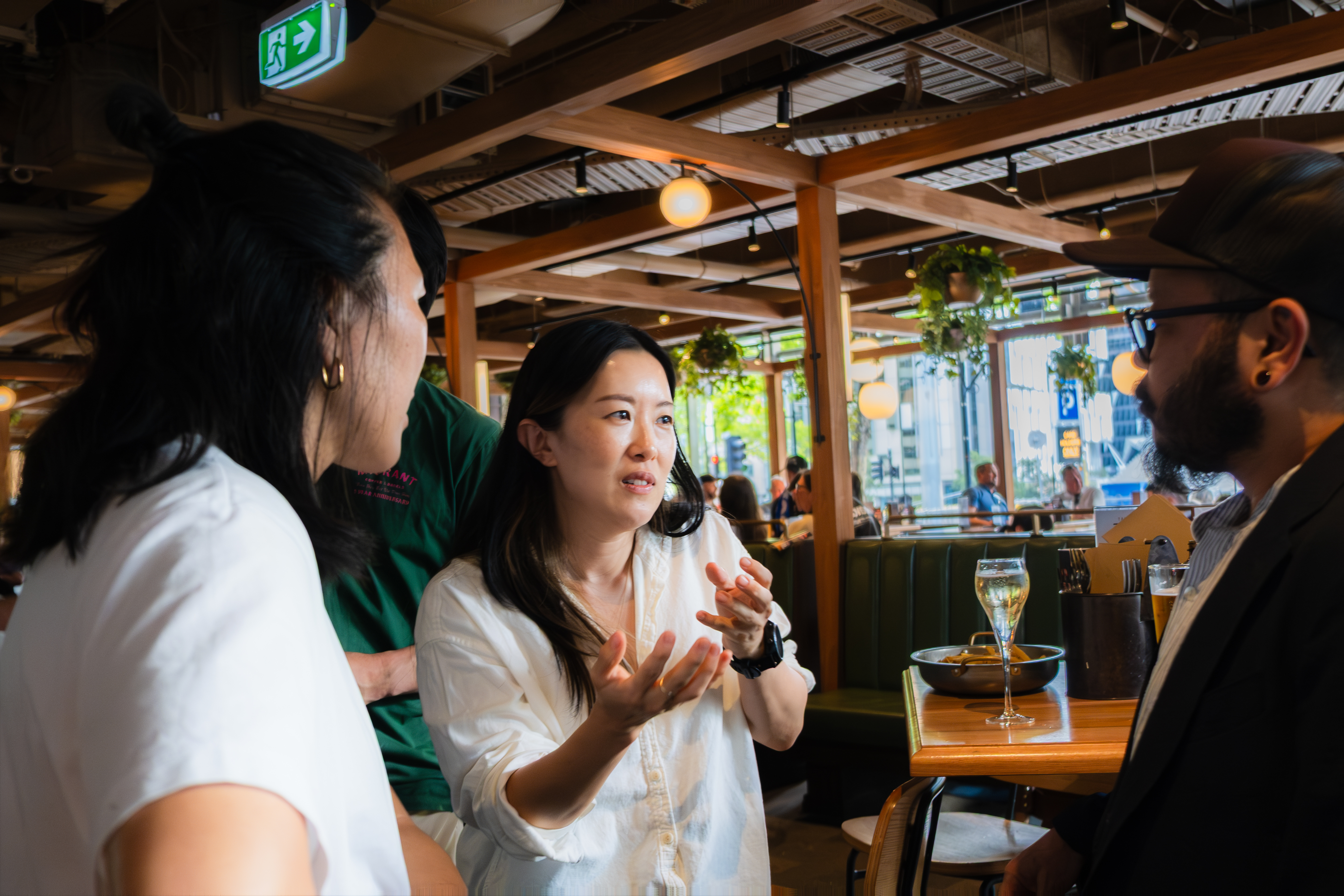Guests talking at KAIAN dinner (2026)
