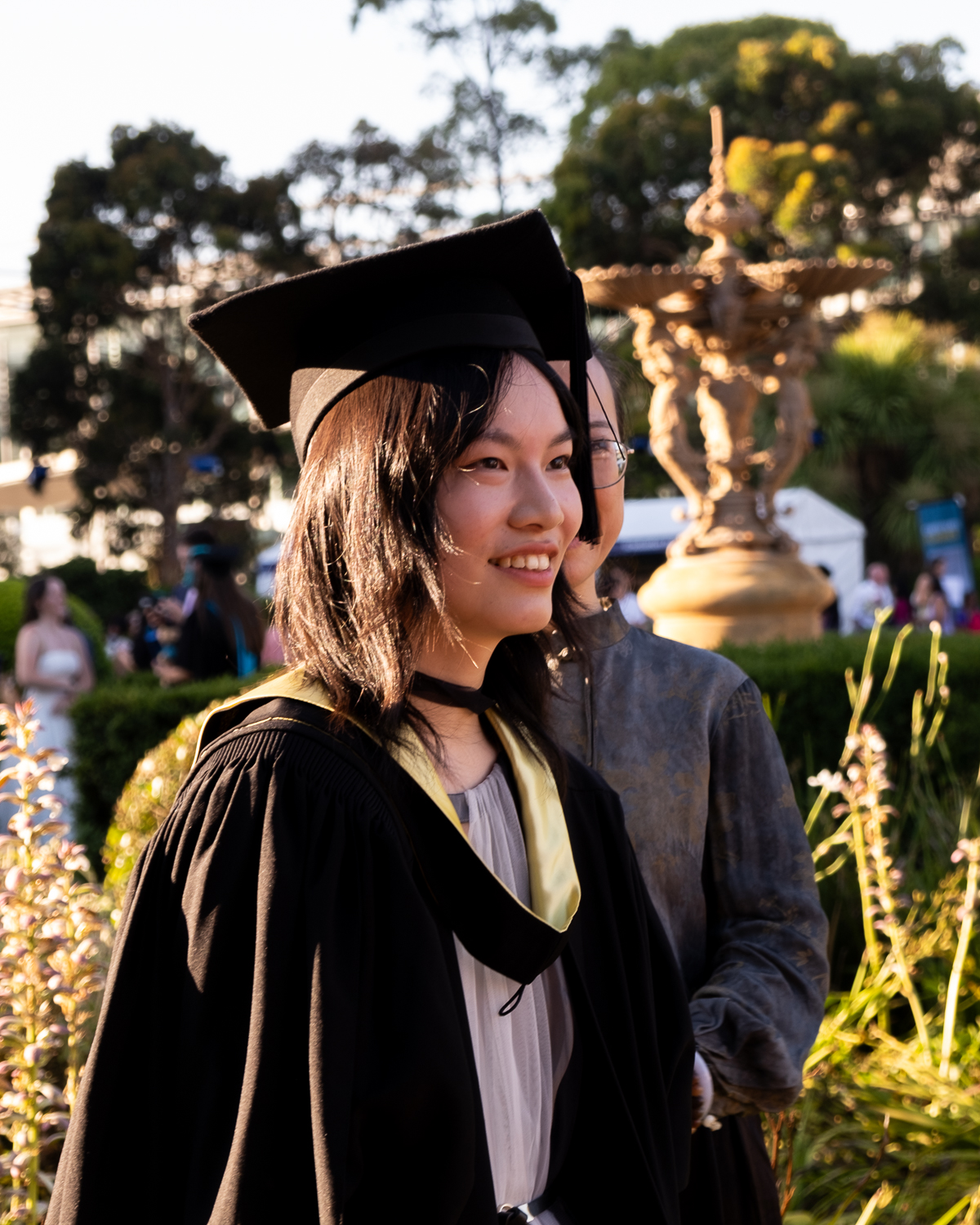 Ray at golden hour, at their graduation (2024)